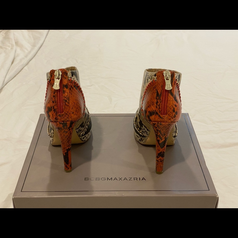 BCBG Maxazria Women’s snake embossed booties - Picture 2 of 2
